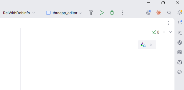 The reload button CLion floats over the editor after CMakeLists.txt is edited: a small circular-arrow icon with a dismiss cross beside it.